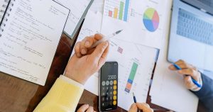 Desk Laptop and Papers